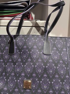 Dooney & Bourke Haunted Mansion tote.